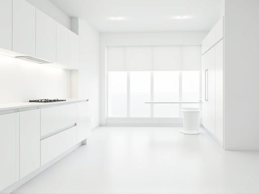 Minimalist kitchen design with white cabinets.